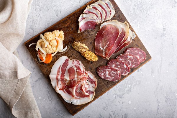 How to Assemble a Gourmet Charcuterie Board with Exotic Meats and Cheeses?